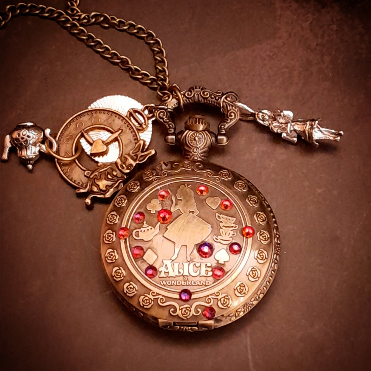 Alice in Wonderland pocket watch necklace with magical fantasy charms and genuine Austrian crystals