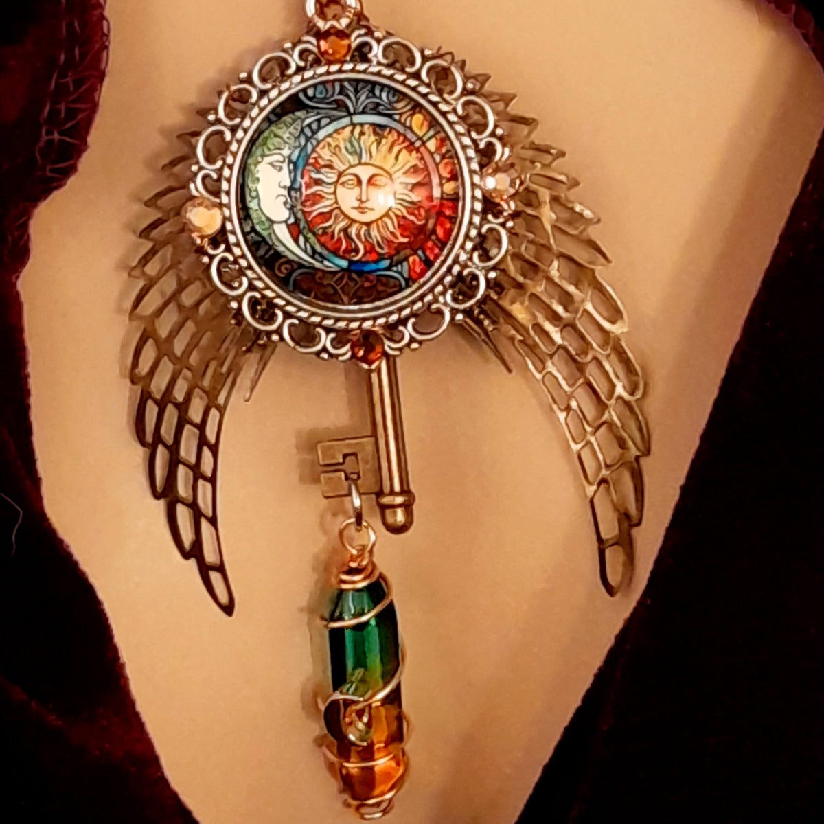 boho hippie sun and moon cabochon necklace glass icicle in pink yellow and green. angel wings swarovski crystals