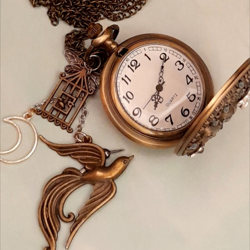 Magical fantasy pocket watch necklace face with lovebirds, birdcage, dragonfly, butterfly and fairy charms, Swarovski crystals, Victorian style, vintage style, Rachel Flam Design