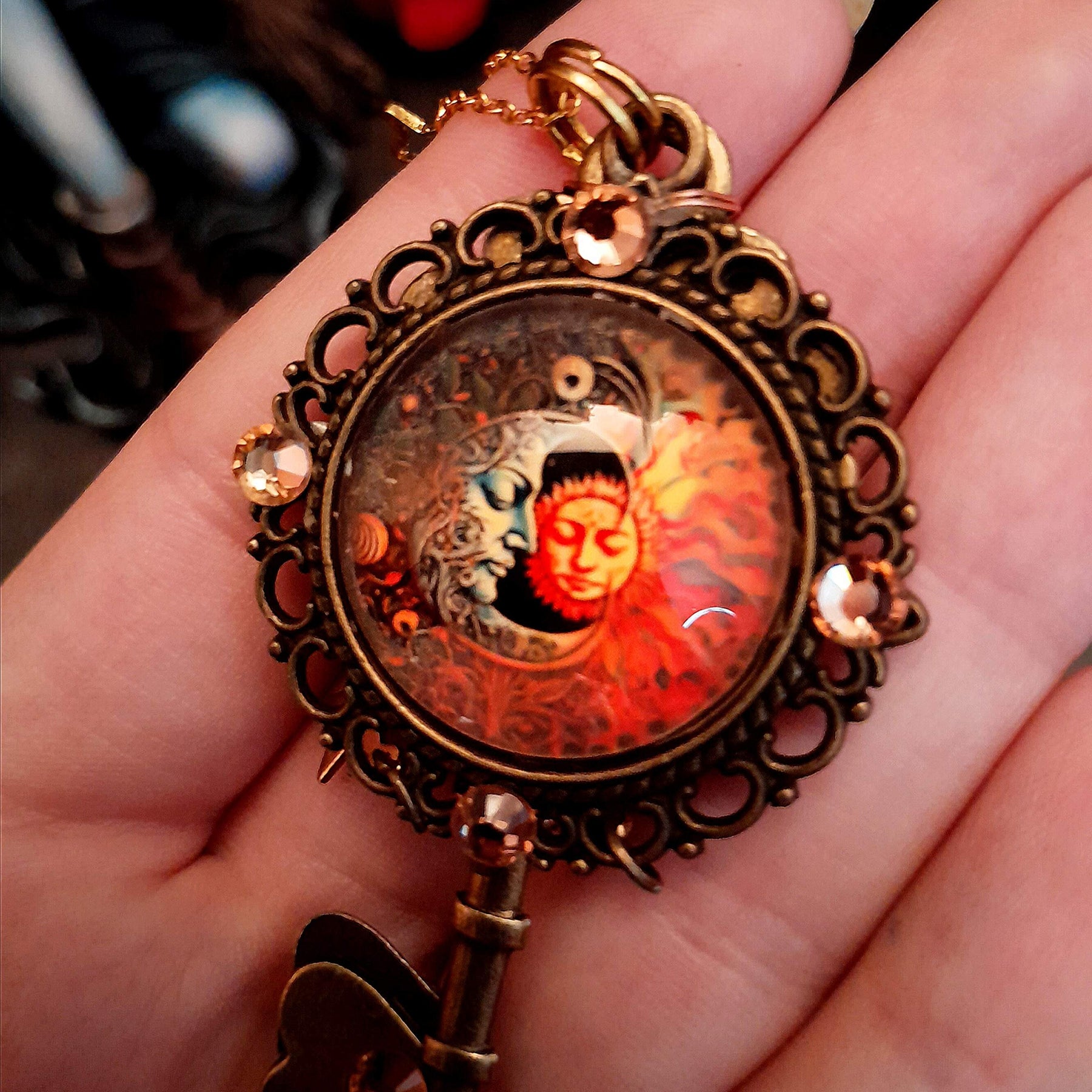 bohemian sun and moon cabochon necklace with stars and gold chain with stars and moons