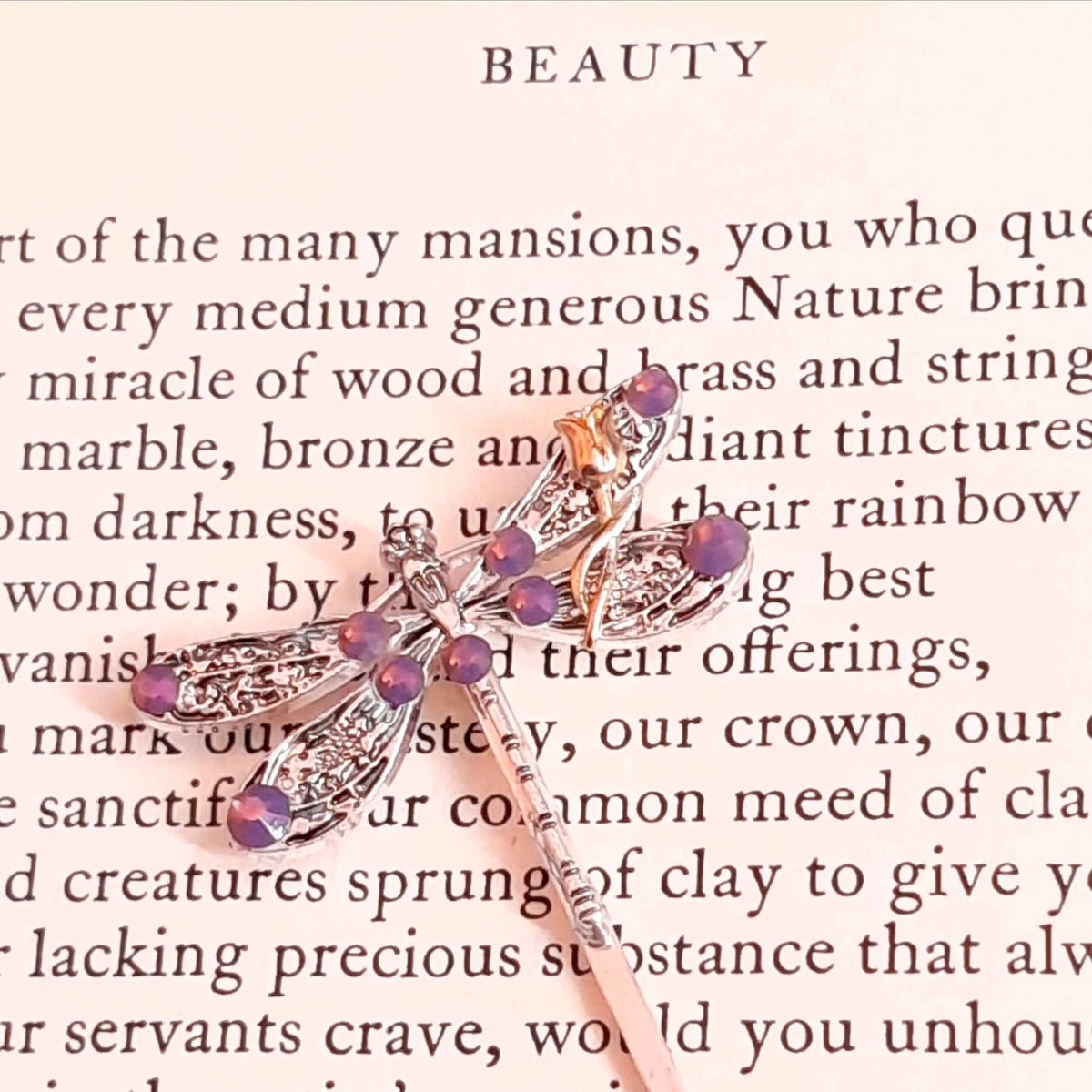 dragonfly hairclip with swarovski amethyst opal purple crystals and a small flower accent