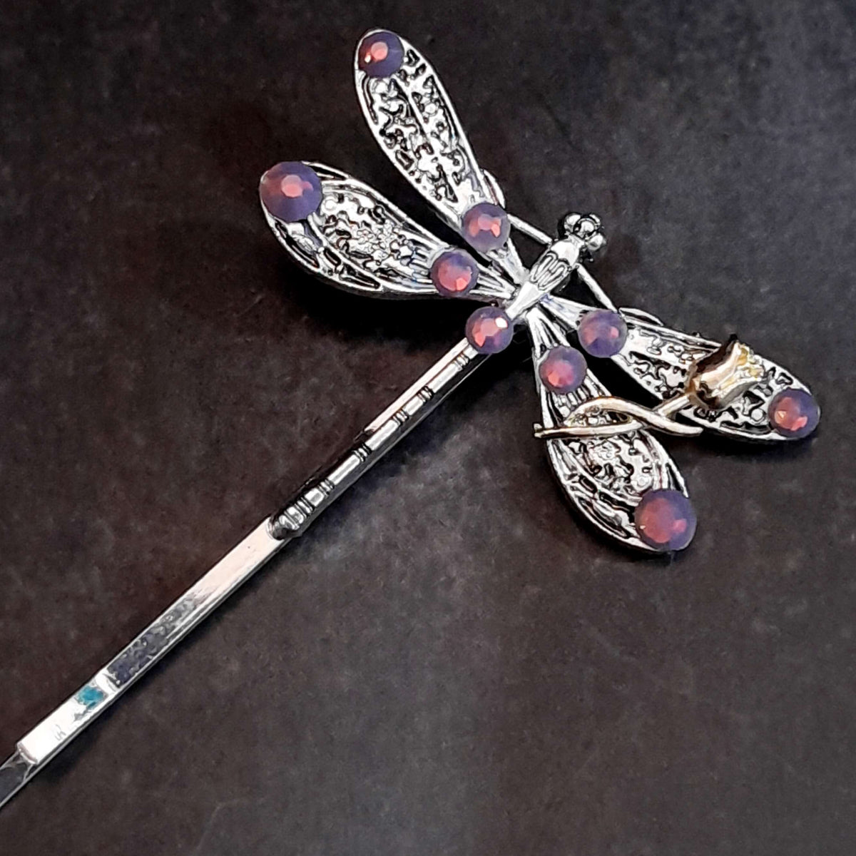 dragonfly hairclip with swarovski amethyst opal purple crystals and a small flower accent