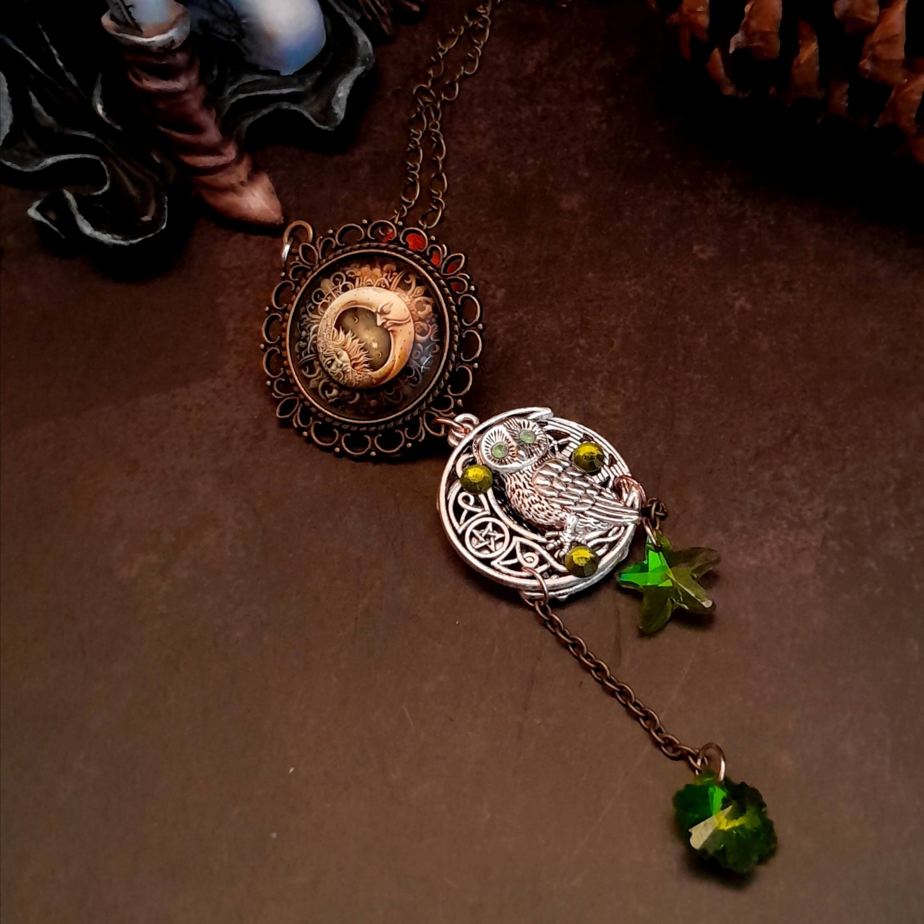Moon sun cabochon necklace with a double sided owl and green swarovski crystals
