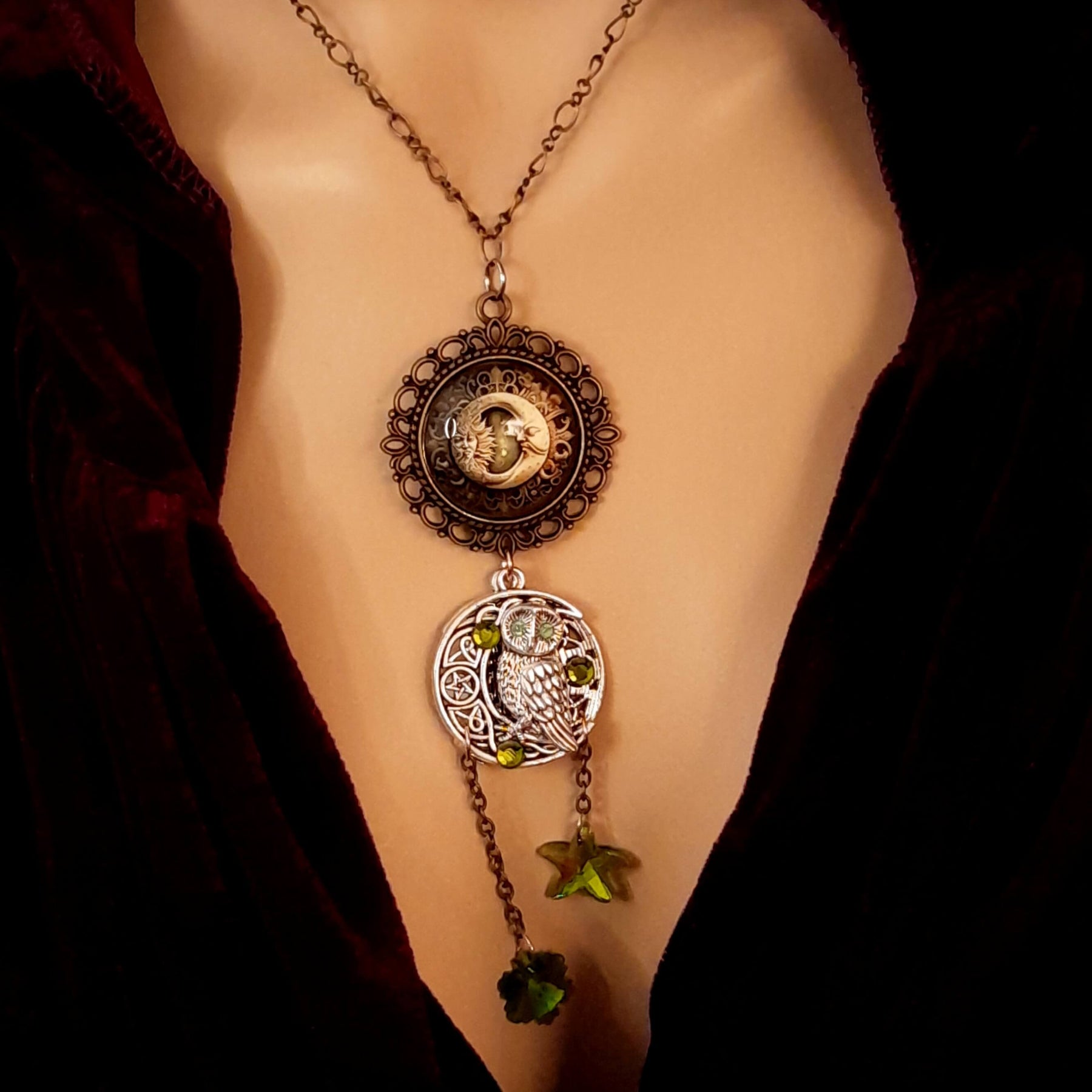 Moon sun cabochon necklace with a double sided owl and green swarovski crystals