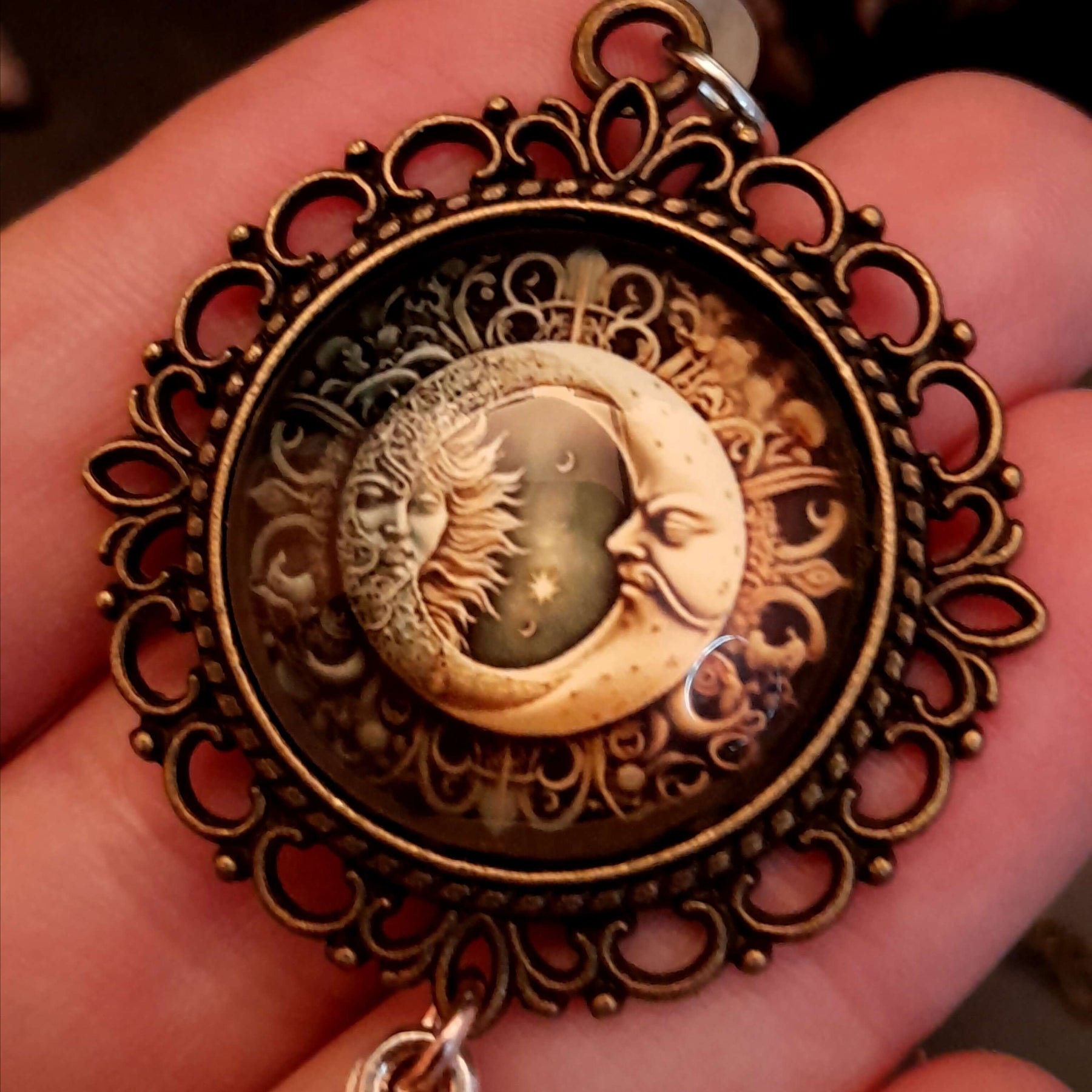 Moon sun cabochon necklace with a double sided owl and green swarovski crystals
