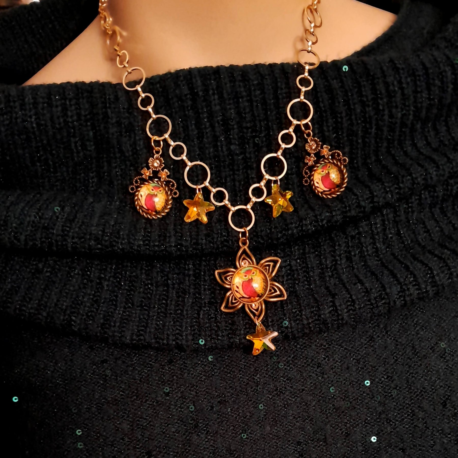 owl necklace with yellow star crystals and yellow brown tones floral settings for owl cabochons