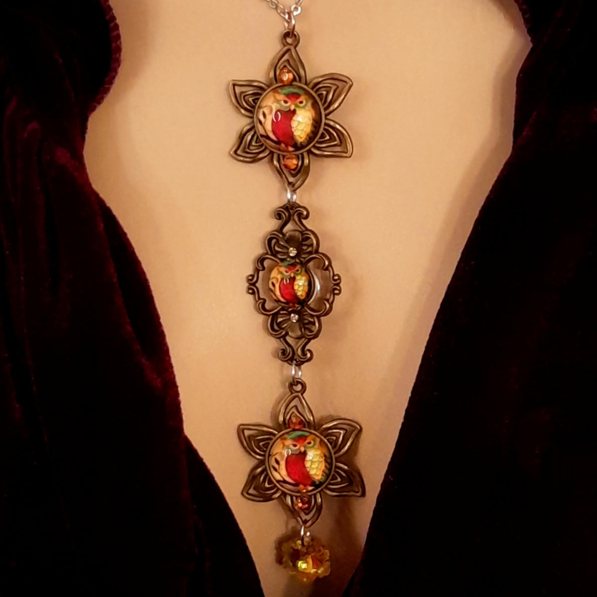 necklace with 3 owl cabochons with yellow backgrounds and Yellow Swarovski crystals