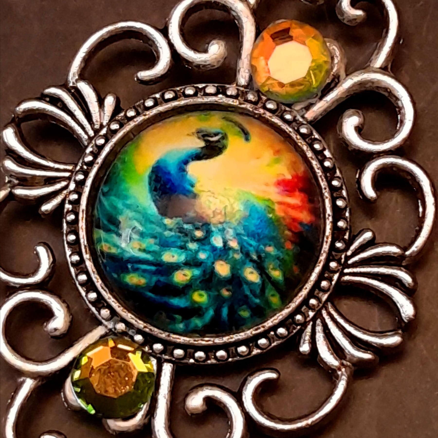 peacock cabochon peacock eye magical phoenix swarovski volcano and peridot crystals hidden fairies on the back