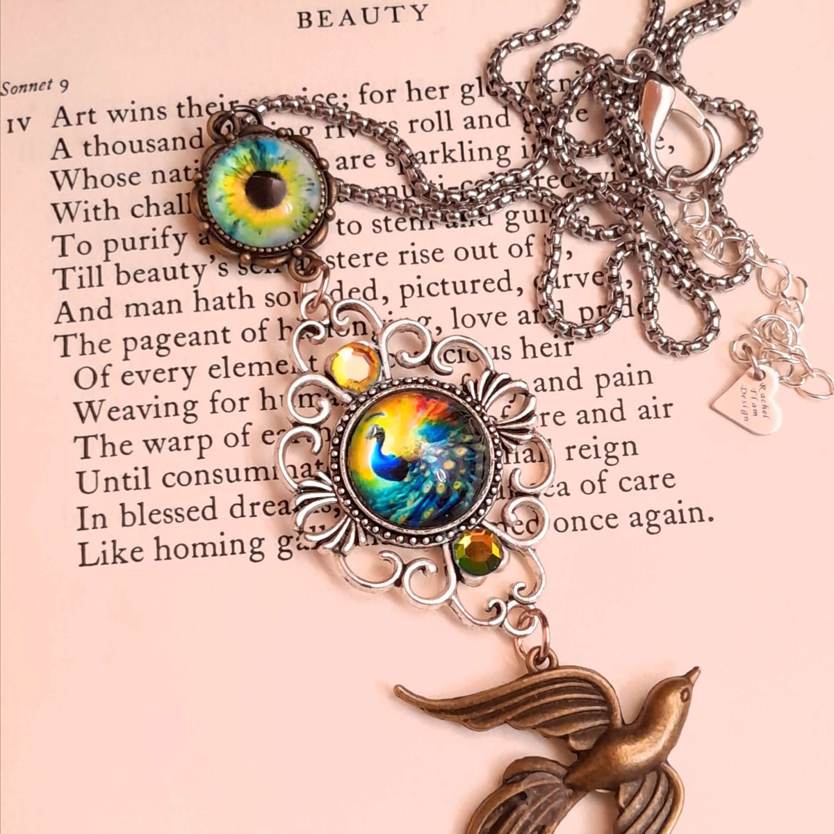 peacock cabochon peacock eye magical phoenix swarovski volcano and peridot crystals hidden fairies on the back
