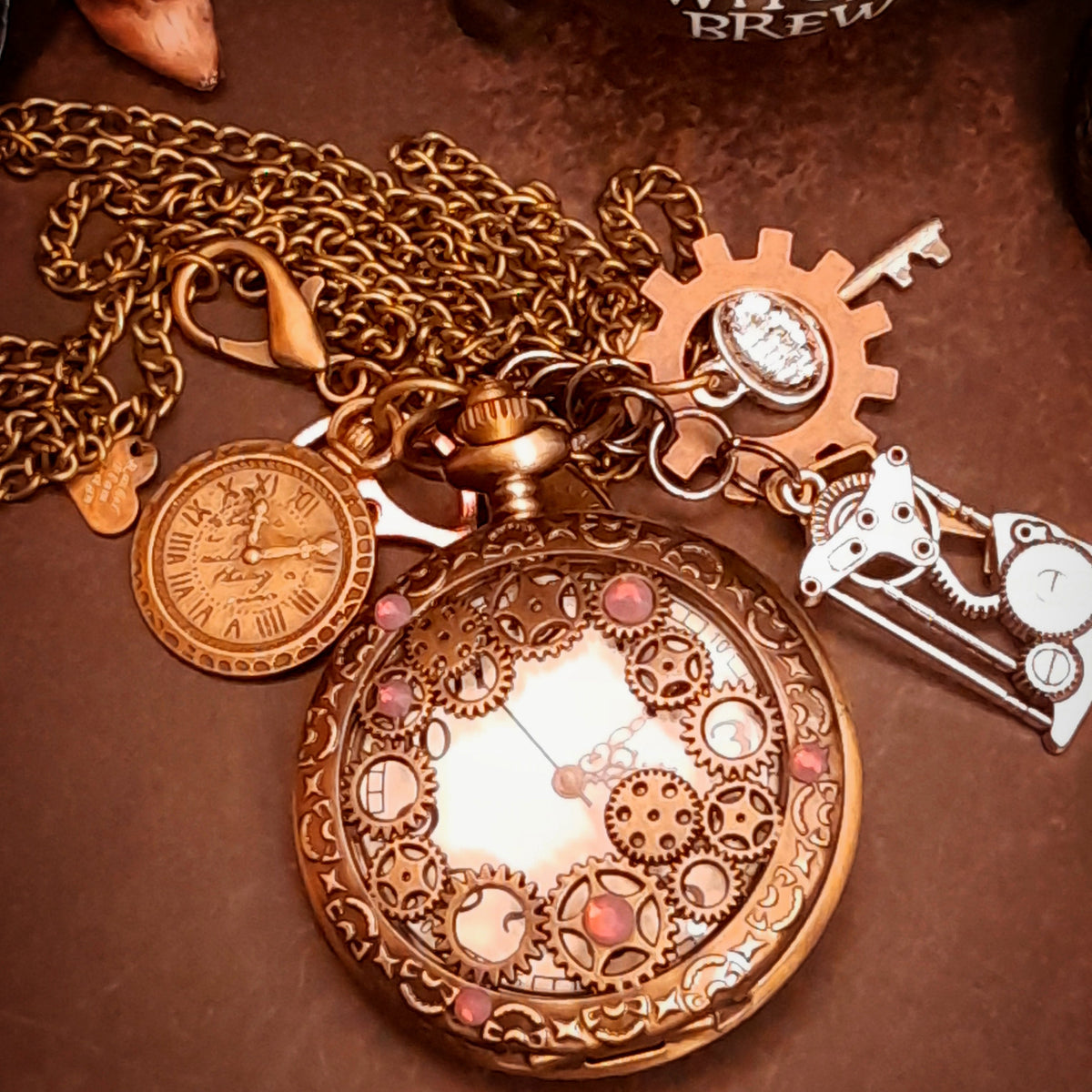 Magical steampunk pocket watch necklace with frosted lavender Swarovski crystals and vintage gear details