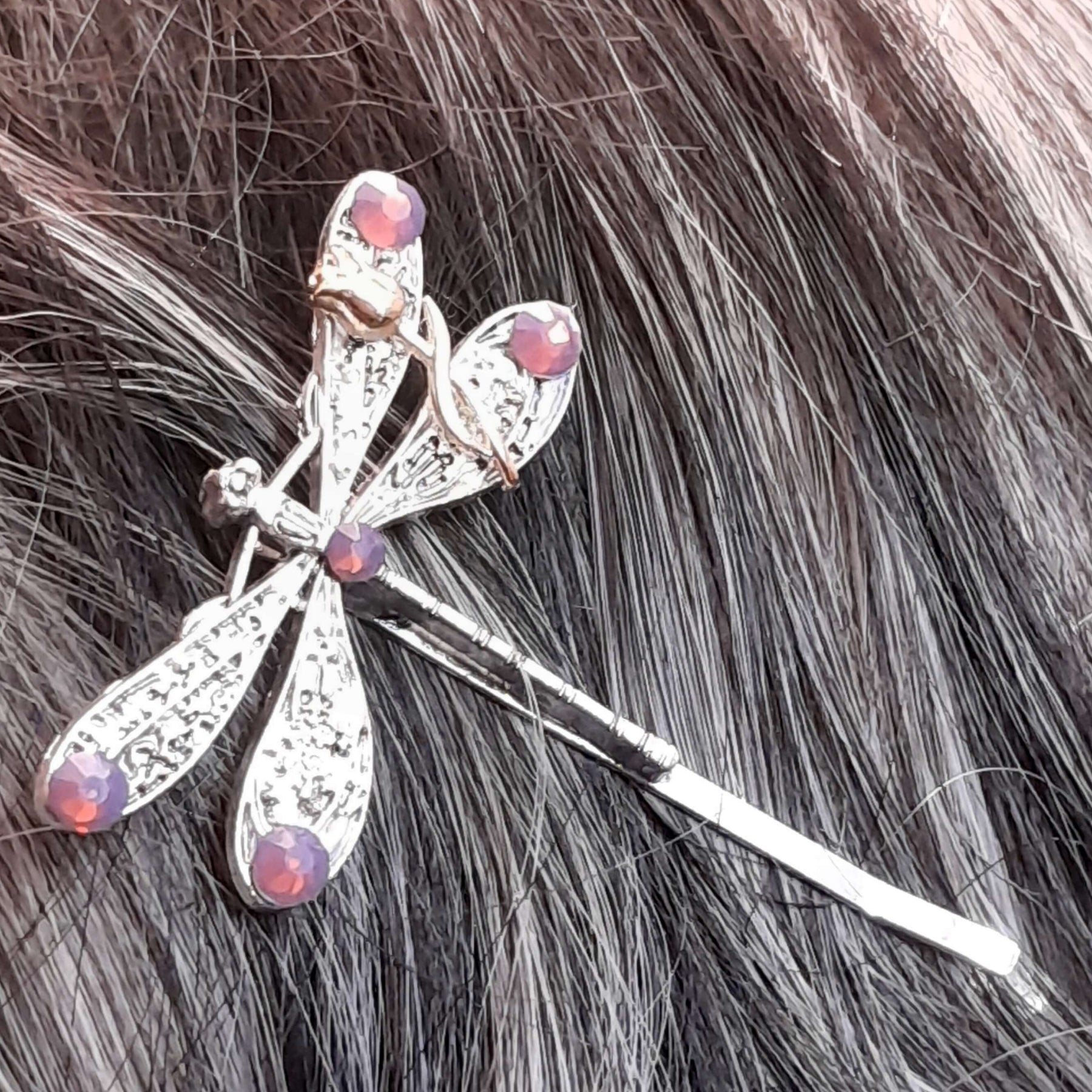 dragonfly hairclip with swarovski amethyst opal purple crystals and a small flower accent
