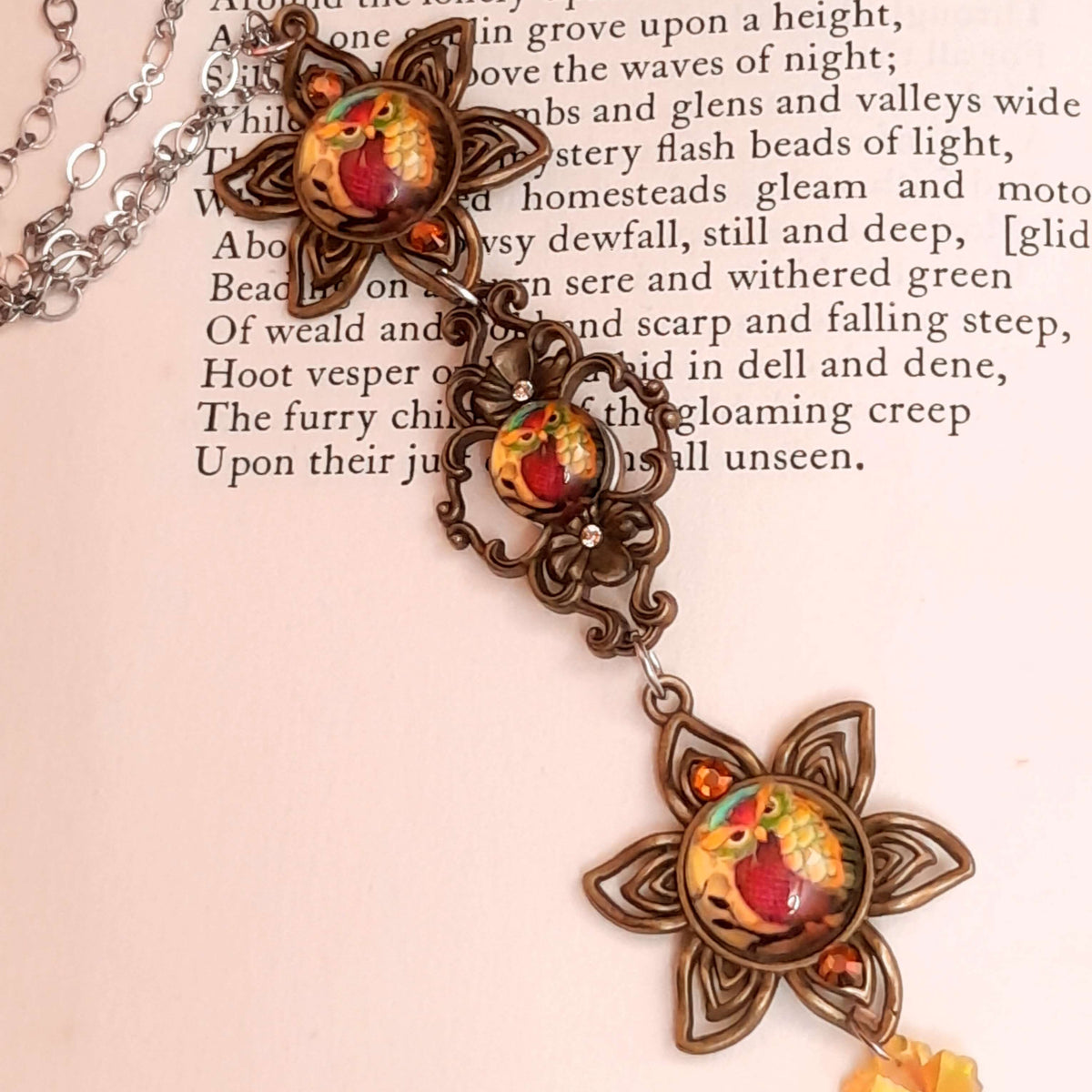necklace with 3 owl cabochons with yellow backgrounds and Yellow Swarovski crystals