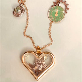 Locket necklace heart shape Alice in Wonderland White Rabbit Clocks Gears Teacup Flatlay 
