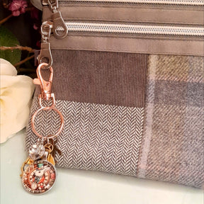 Magical fantasy Alice in Wonderland purse charm clipped to bag zipper with White Rabbit clock medallion and Swarovski crystal charms, Victorian style vintage style