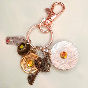 Alice in Wonderland magical fantasy purse charm with White Rabbit clock face, sun charm, teacup, ornate key, and Vitrail Medium Swarovski crystal — Victorian style vintage style