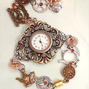 Handmade Alice in Wonderland Victorian style hand chain watch with Swarovski crystals worn on hand showing White Rabbit charm and clock disc