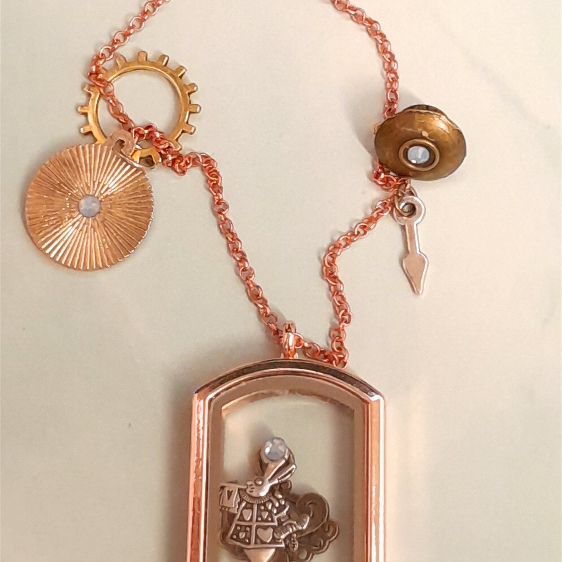 Magical fantasy openable rectangle locket pendant with White Rabbit and gear charms inside, Swarovski crystal accent, watch hand charm on chain, Victorian style vintage style