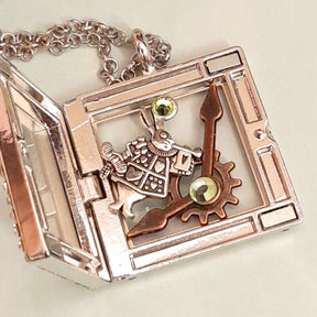 Magical fantasy Alice in Wonderland square locket necklace open showing White Rabbit, gear and clock hand charms inside with green Swarovski crystal accents,  chain, Victorian style vintage style