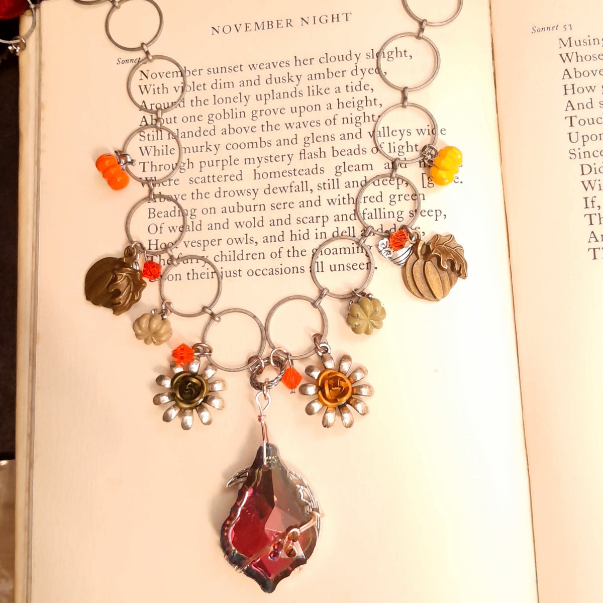 Halloween necklace with a large baroque Volcano Swarovski crystal shifting from pink to purple to a warm yellowish tone, nature-inspired flower details, Victorian style vintage style handmade jewelry