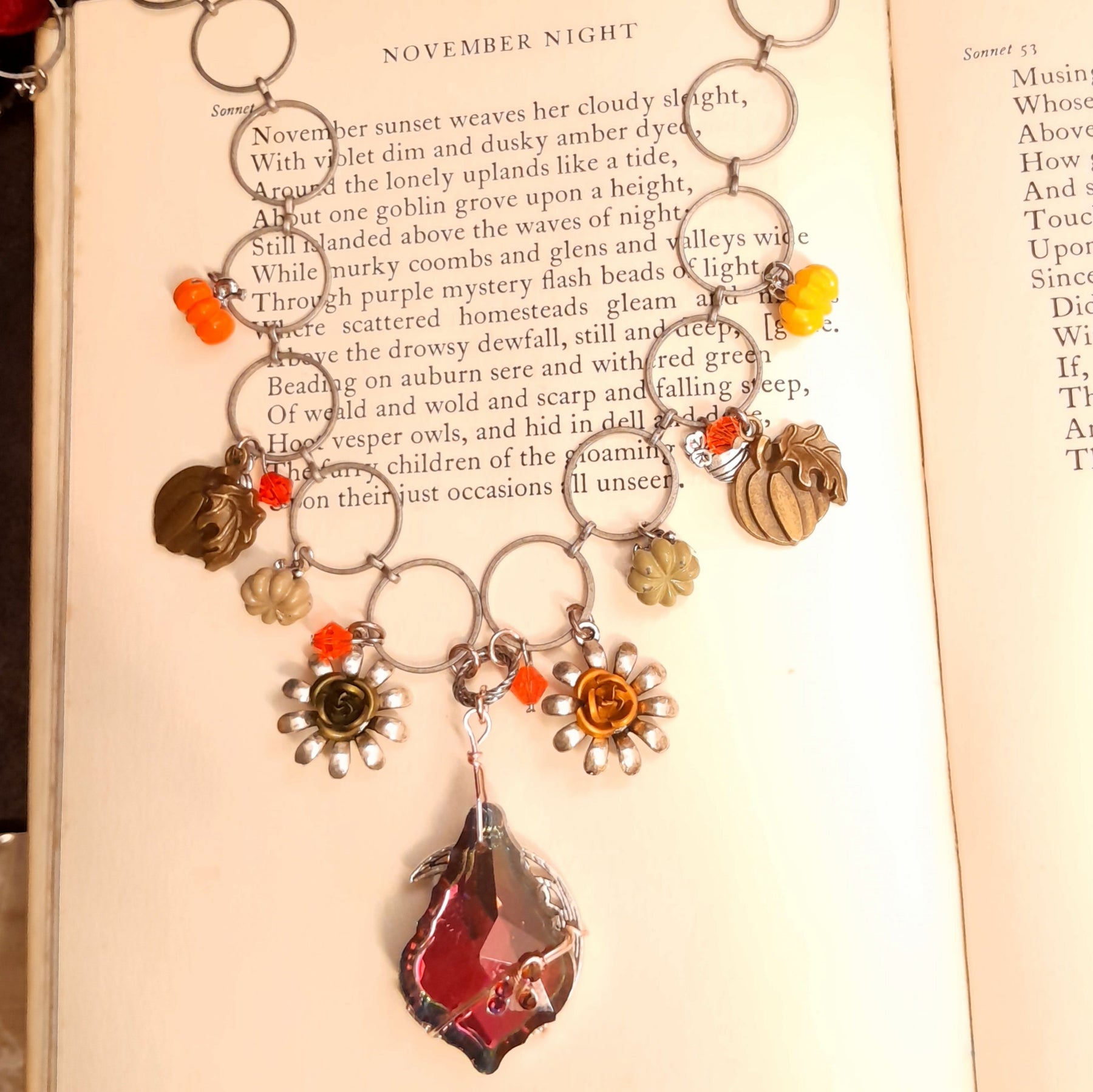 Halloween necklace with a large baroque Volcano Swarovski crystal shifting from pink to purple to a warm yellowish tone, nature-inspired flower details, Victorian style vintage style handmade jewelry