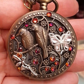 Magical fantasy pocket watch necklace with lovebirds and fairy charms, Swarovski crystals, Victorian style, vintage style, Rachel Flam Design