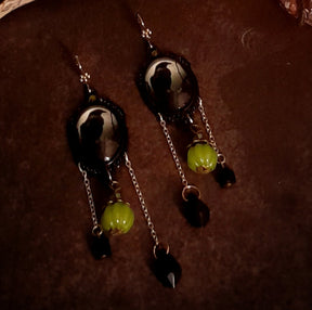Black crow pumpkin earrings with green and black Swarovski crystals in Victorian style and vintage style by Rachel Flam Design