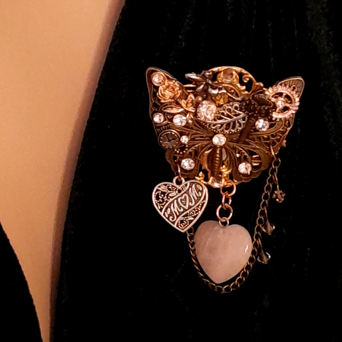 
Victorian style vintage style steampunk butterfly brooch close-up with nature-inspired elements and world-renowned genuine Swarovski crystals — handmade fantasy brooch

