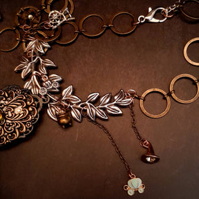 fairytale crow necklace witch hat spinning wheel cauldron mirror broom pumpkin carraige magic lamp