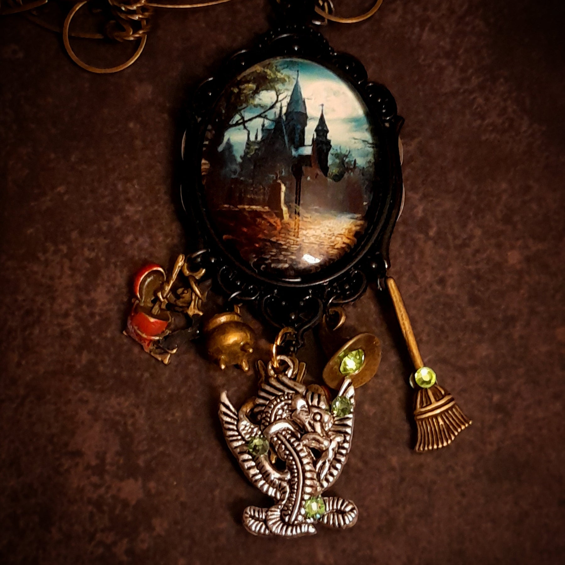 Victorian style vintage style magical castle necklace with dragon charm, witchy details, filigree pendant, and genuine Swarovski crystals, Rachel Flam Design