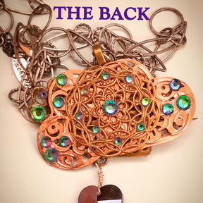 
One-of-a-kind handmade fantasy necklace featuring bee, hummingbird, and dragonfly with world-renowned genuine Swarovski crystals and multicolored heart

