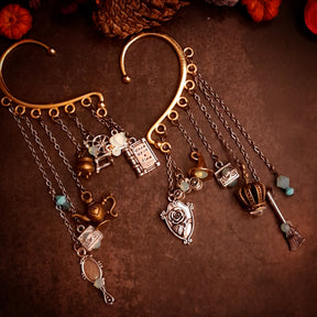 Victorian style vintage style fairy tale ear wrap for non-pierced ears with Once Upon a Time book, pumpkin carriage, crown, oval mirror, family crest, treasure chests, genie lamp, spinning wheel, broom, and cauldron charms, Pacific Opal Swarovski crystals, magical fantasy jewelry