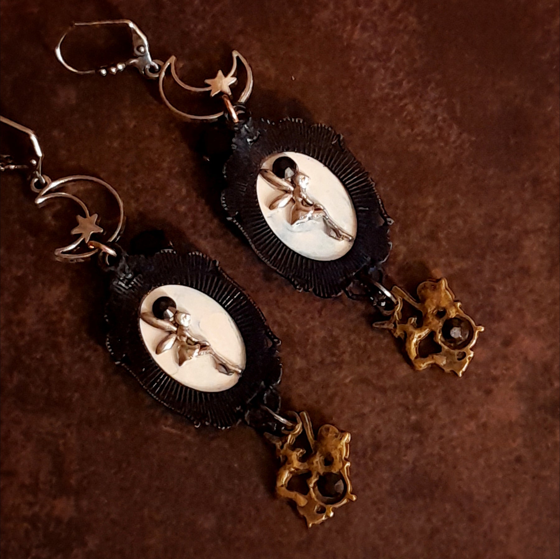 Back view of witchy Halloween crow and skull earrings with hidden fairy details, Swarovski crystals, and magical fantasy Victorian style and vintage style design by Rachel Flam Design

