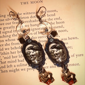 Gothic raven and skull Halloween earrings with celestial details, witch charms, and black Swarovski crystals, magical fantasy Victorian style and vintage style jewelry by Rachel Flam Design