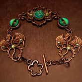 green druzy crystal bracelet with green dragon eyes and brass dragons swarovski green crystals and flower clasp