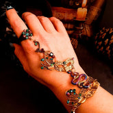 slave bracelet hand chain with adjustable flower ring and masks. colcorful flowers and vines a serpent snake and swarovski crystals