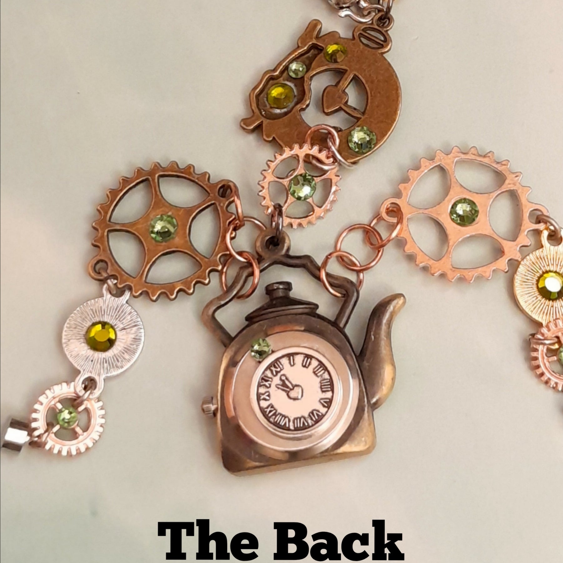 Magical fantasy hand chain teapot watch Alice in Wonderland ring and charm detail with green Swarovski crystals teapot and rabbit charms, Victorian style vintage style