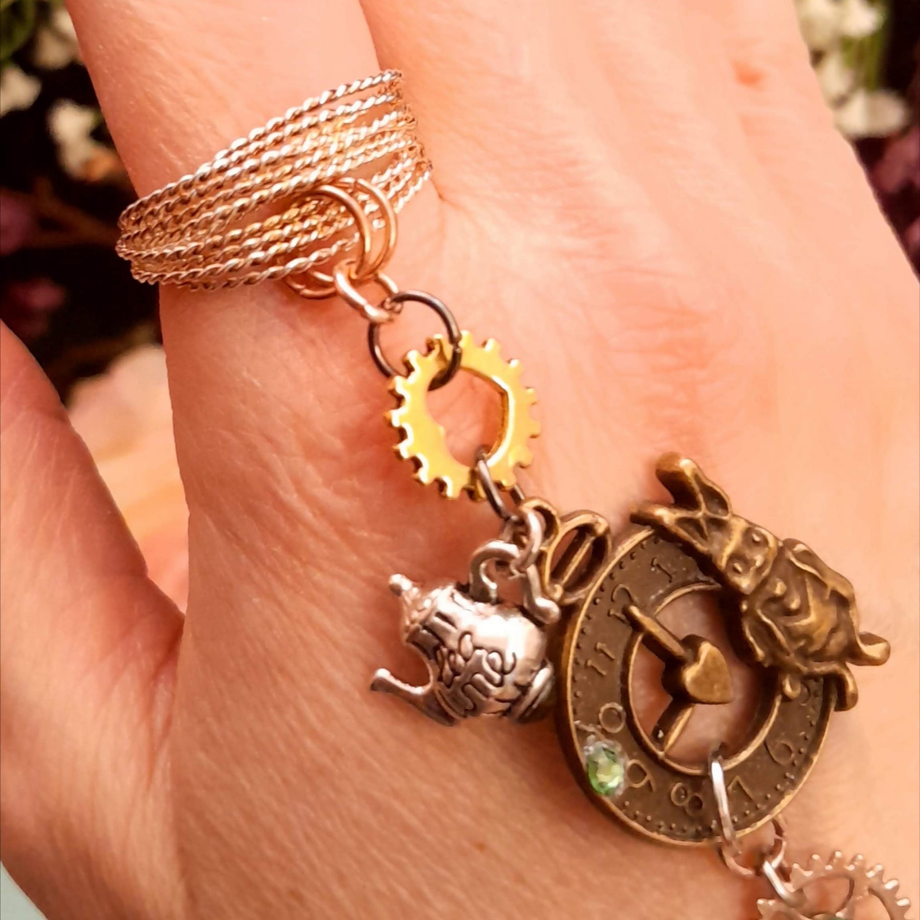 Magical fantasy hand chain teapot watch Alice in Wonderland ring and hand top view with green Swarovski crystals, Victorian style vintage style
