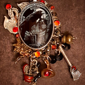 Detail of handmade witchy black crow fairy and dragon necklace featuring fire opal and black Swarovski crystals, Victorian style vintage style magical fantasy jewelry