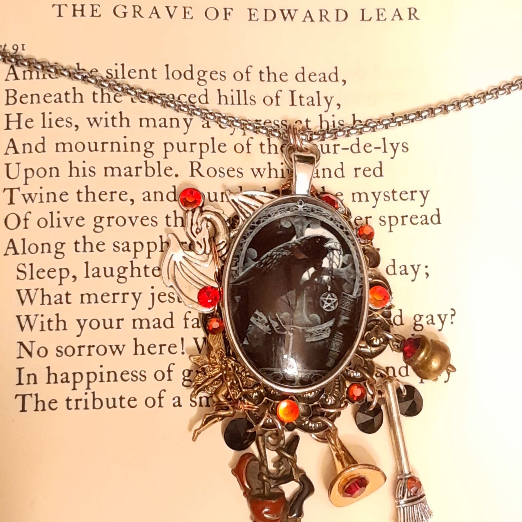 Handmade layered witchy black crow fairy and dragon necklace with detailed fantasy charms, cauldron, witch hat and broom, Swarovski crystals, Victorian style vintage style magical fantasy jewelry