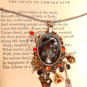 Handmade layered witchy black crow fairy and dragon necklace with detailed fantasy charms, cauldron, witch hat and broom, Swarovski crystals, Victorian style vintage style magical fantasy jewelry