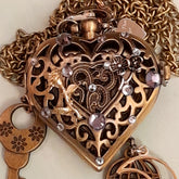 Handmade magical fantasy heart pocket watch necklace filigree front with lavender Swarovski crystals and flower detail, antiqued brass chain, Victorian style vintage style