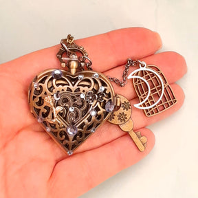 Handmade magical fantasy heart pocket watch necklace quartz watch face with silver heart, flower key and birdcage charms, antiqued brass, Victorian style vintage style