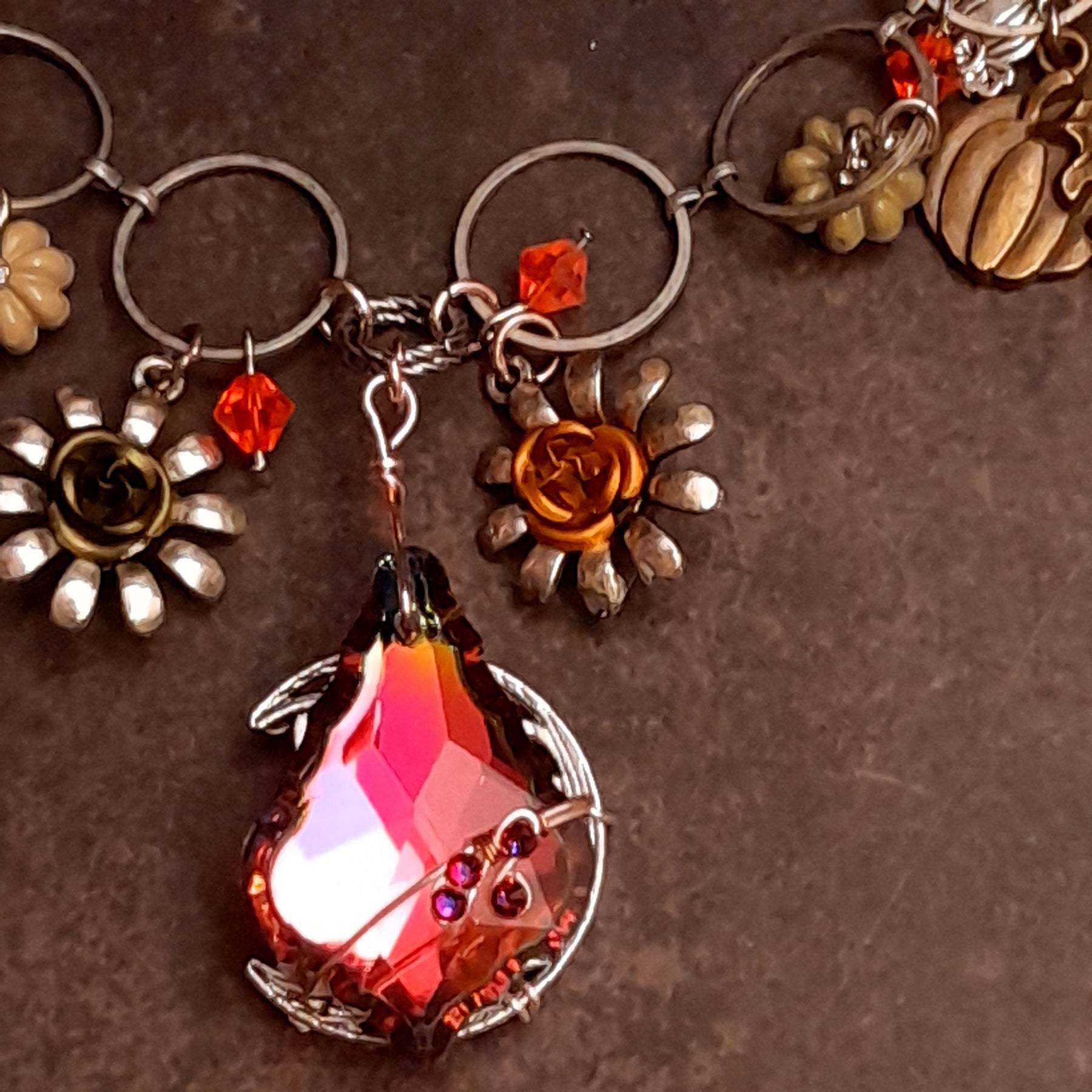 Handmade Halloween necklace with Hyacinth Swarovski crystals nestled between pumpkins and flower details, Victorian style vintage style nature jewelry