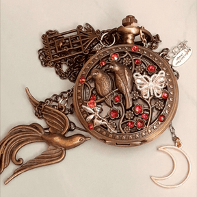 Handmade magical fantasy pocket watch necklace with lovebirds, phoenix, moon, butterfly and fairy charms, Swarovski crystals, Victorian style, vintage style, Rachel Flam Design