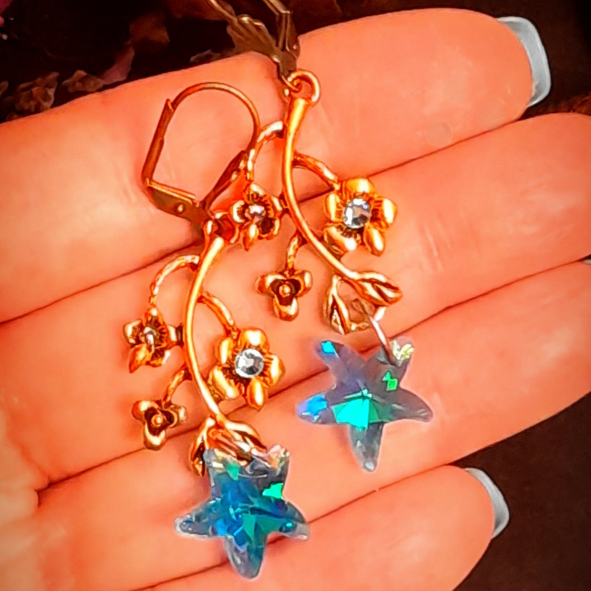 Magical turquoise earrings with Swarovski stars, curving leaves and flower details, Victorian style and vintage style fantasy jewelry by Rachel Flam Design

