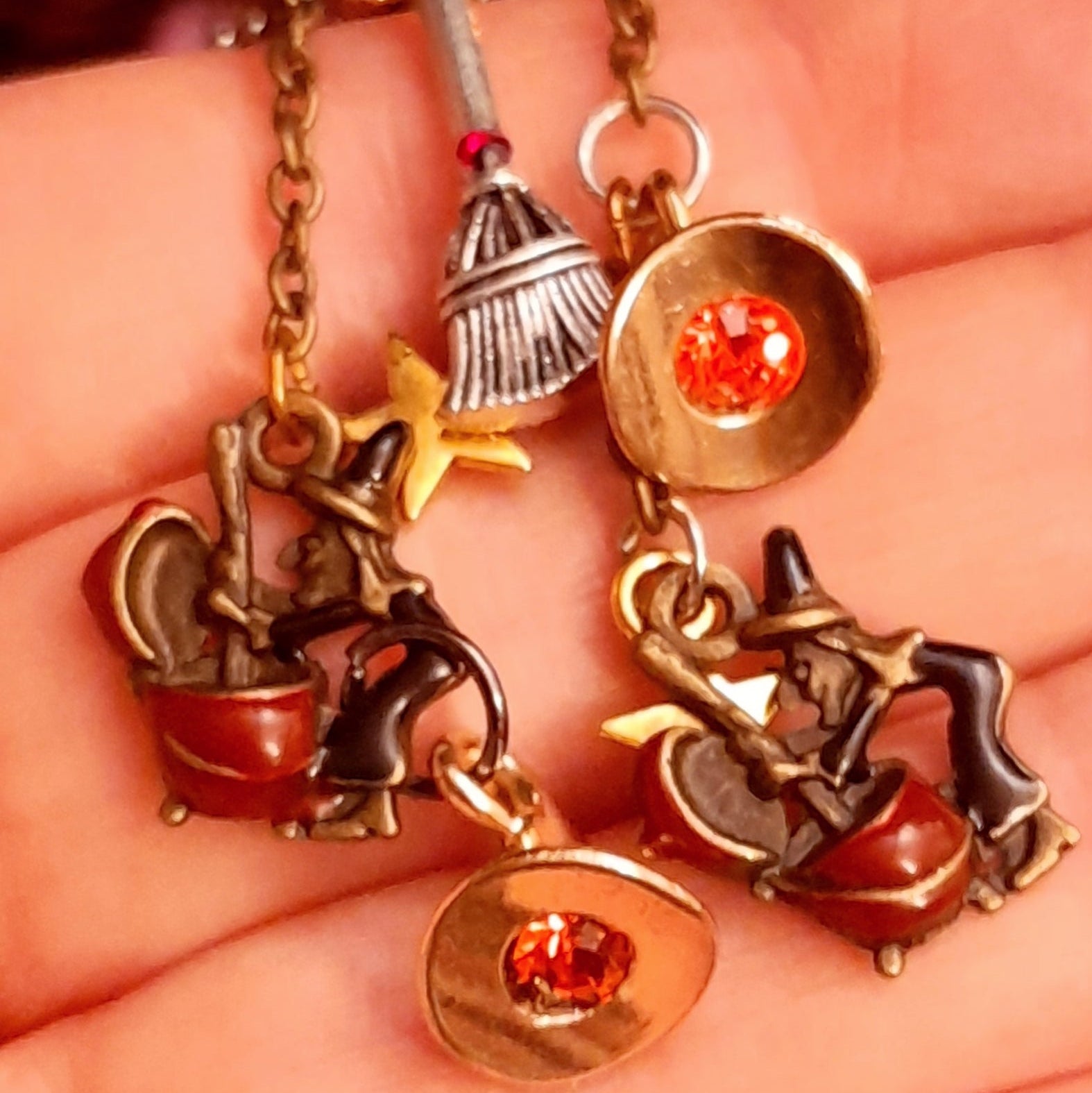 Magical handmade witch earrings with tiny stars, brooms, cauldrons, witch charms, and red Swarovski crystals, Victorian style and vintage style fantasy jewelry by Rachel Flam Design