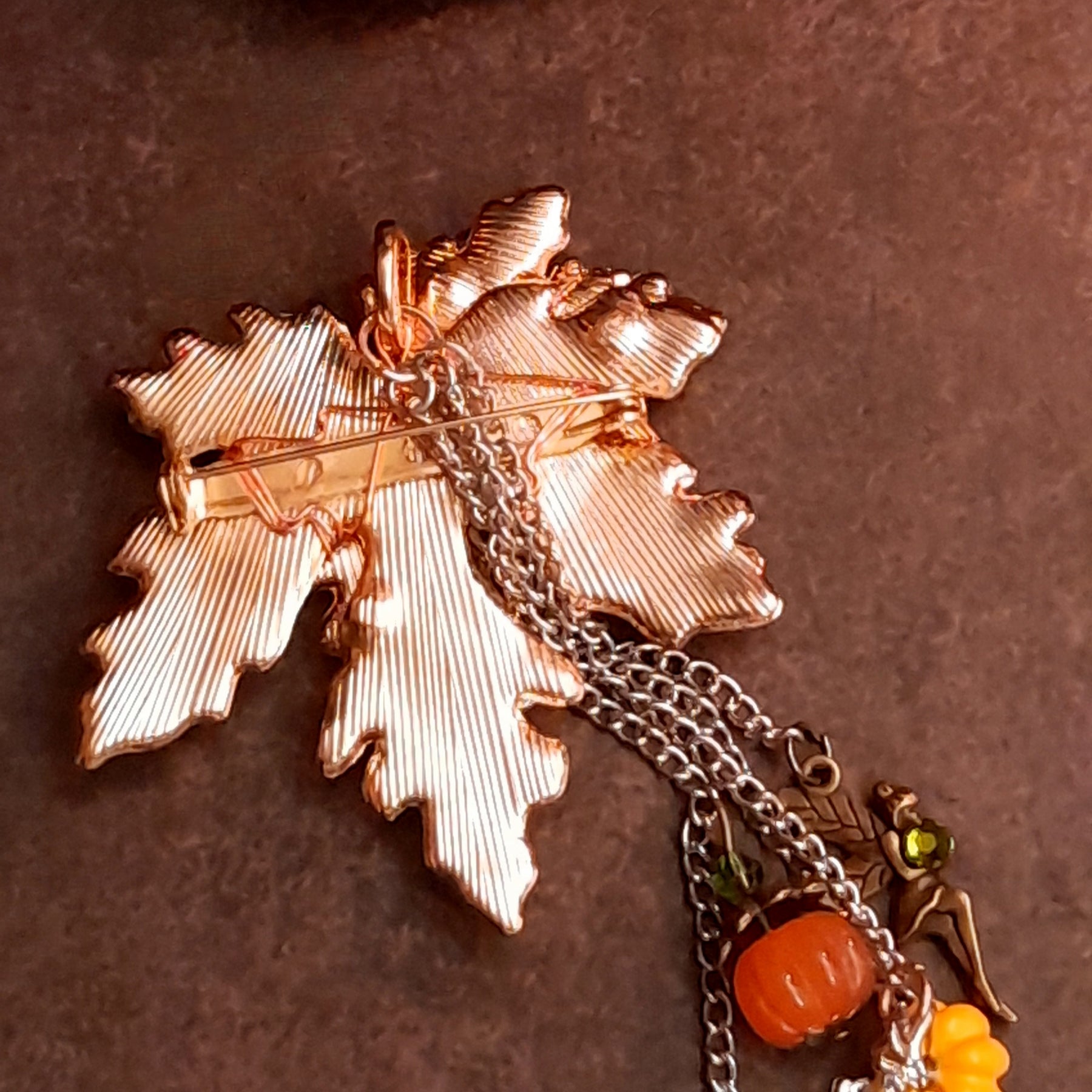Back of maple leaf brooch showing secure pin closure and textured leaf detail, Victorian style vintage style handmade jewelry by Rachel Flam Design