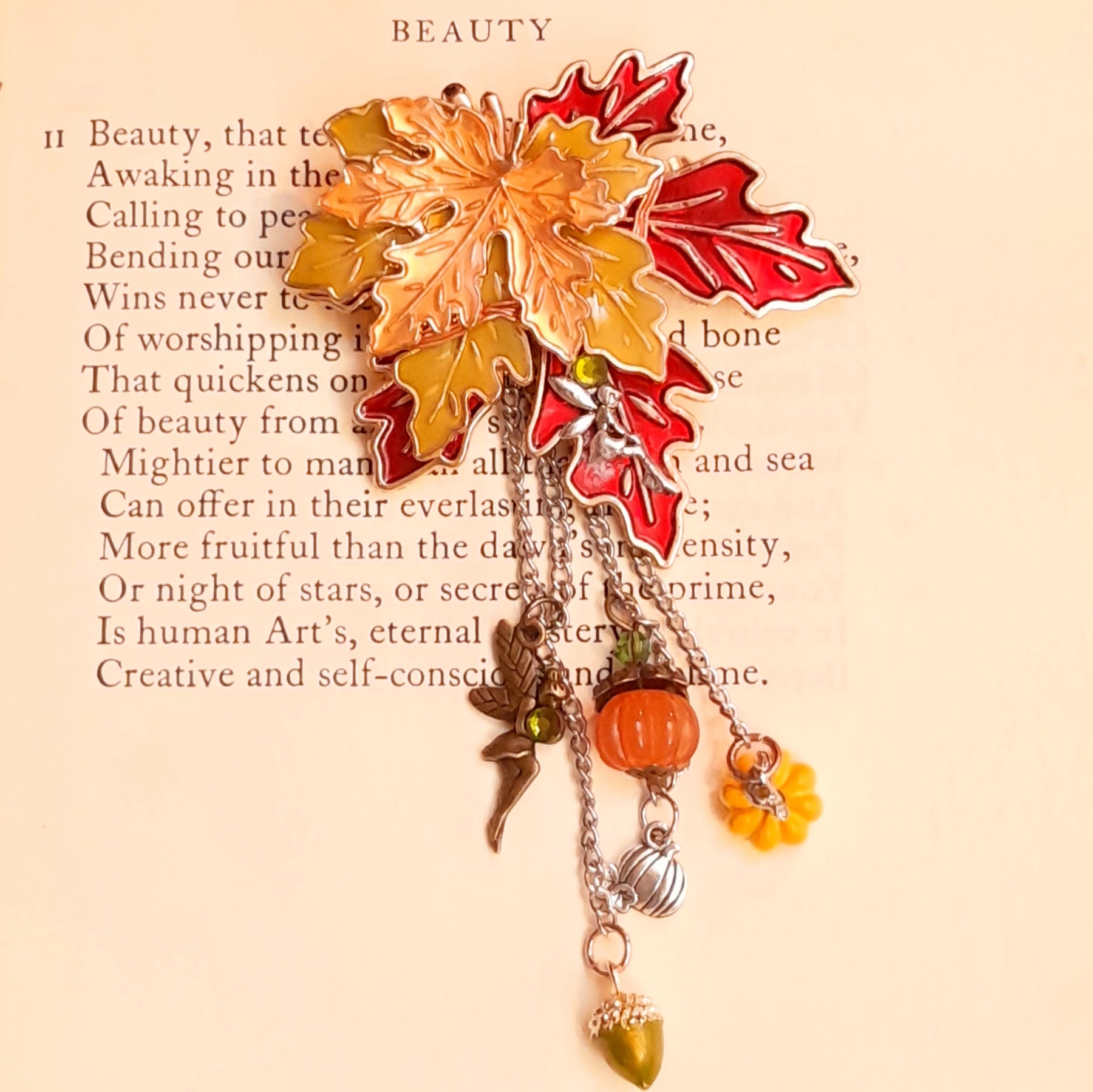 Layered maple leaf pin with dangling fairy, pumpkin and acorn charms and Swarovski crystals, Victorian style vintage style nature jewelry by Rachel Flam Design