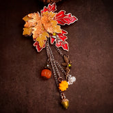Handmade maple leaf brooch with fairy and pumpkin charms, Swarovski crystals, Victorian style vintage style fantasy jewelry by Rachel Flam Design