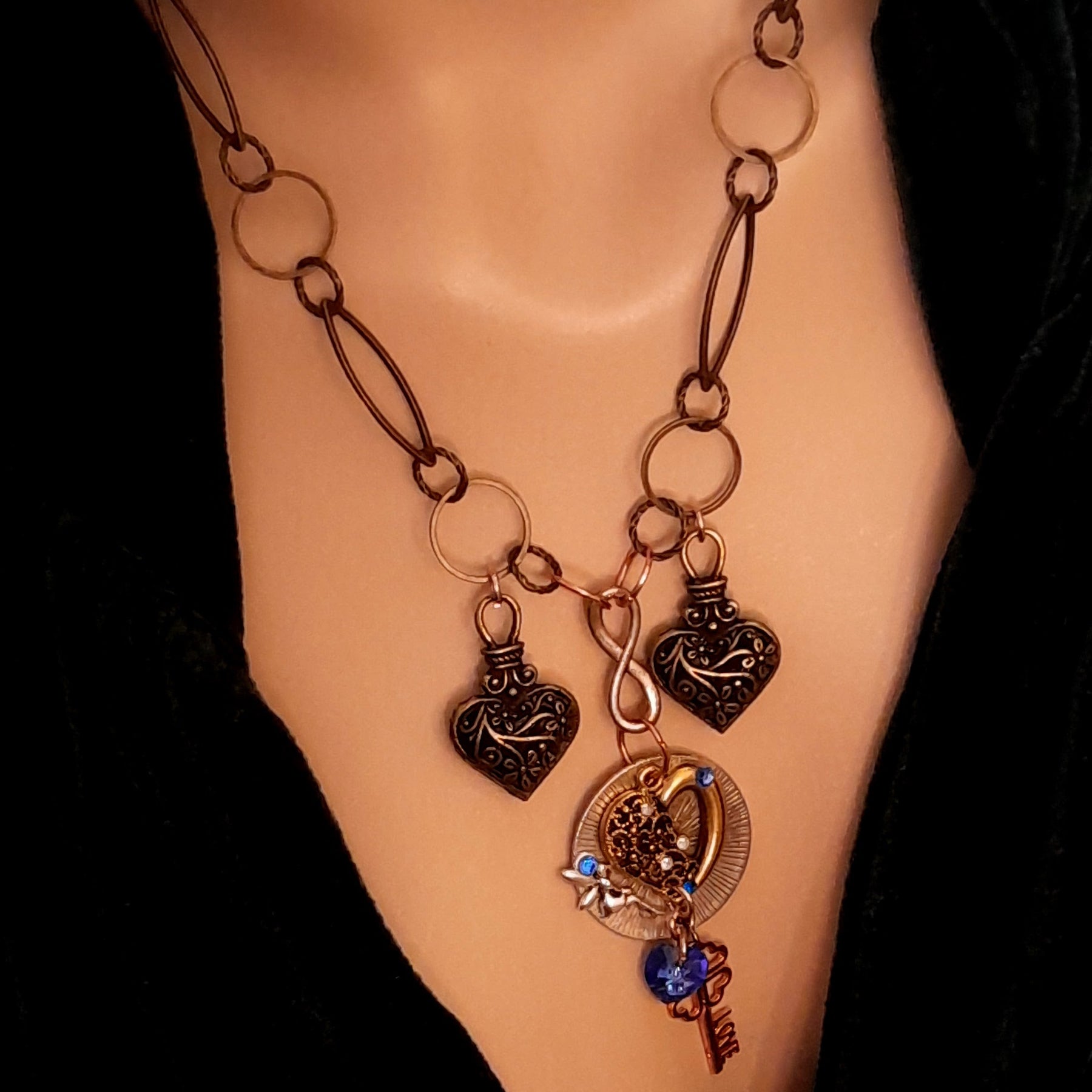 
Matching necklace set heart detail of sapphire blue world-renowned genuine Swarovski crystals and fairy charm, Victorian style vintage style


